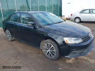 2018 Volkswagen Jetta 1.4T SE with VIN 3VWDB7AJ8JM240887, listed as a IAAI auction lot 40657661 with 76,568 mi miles. Bid and sale history available at carsss.com. Image 1.