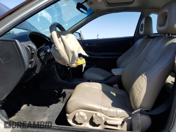 2000 Acura Integra LS with VIN JH4DC4453YS014754, listed as a Copart auction lot 61295265 with 135,573 mi miles and Salvage title. Bid and sale history available at DreamBid. Image 7.