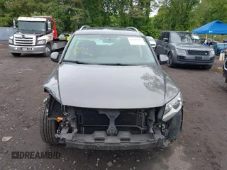 2015 Volkswagen Tiguan S z VIN WVGAV7AX6FW567468, wystawiony jako IAAI lot #42330317 z przebiegiem 143 984 mil mil oraz . Historia ofert i sprzedaży dostępna na DreamBid. Obrazek 12.