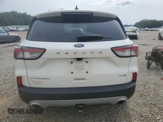 2020 Ford Escape Titanium z VIN 1FMCU9J9XLUB57675, wystawiony jako Copart lot #57777795 z przebiegiem Nie podano mil oraz Szkoda całkowita • Salvage title. Historia ofert i sprzedaży dostępna na DreamBid. Obrazek 6.