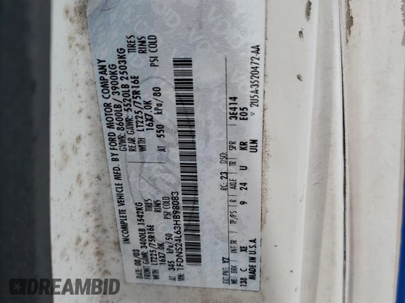 2003 Ford Econoline Cargo with VIN 1FDNS24L63HB98083, listed as a Copart auction lot 65953715 with 121,326 mi miles and Salvage title. Bid and sale history available at DreamBid. Image 13.