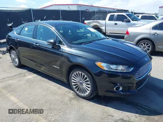 2013 Ford Fusion Titanium Hybrid with VIN 3FA6P0RU2DR288773, listed as a IAAI auction lot 41803708 with 85,868 mi miles and . Bid and sale history available at DreamBid. Image 1.