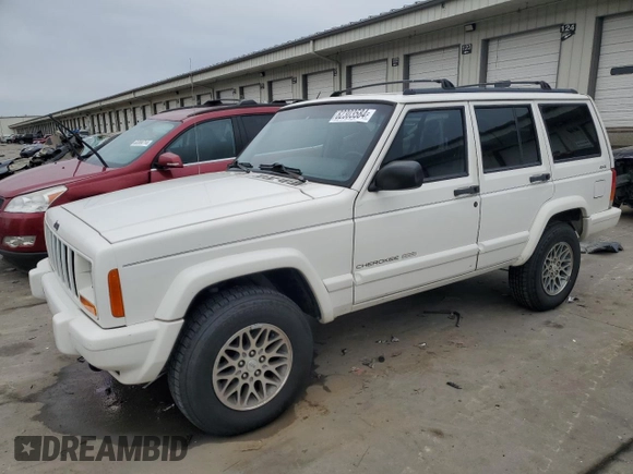 1997 Jeep Cherokee Country with VIN 1J4FJ78S9VL576899, listed as a Copart auction lot 82303584 with 335,746 mi miles and Salvage Title. Bid and sale history available at carsss.com. Image 1.
