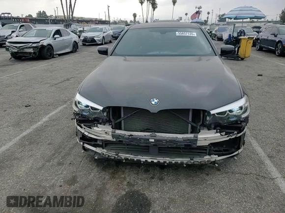 2017 BMW 5 Series 540i with VIN WBAJE5C33HG915675, listed as a Copart auction lot 55857135 with 57,330 mi miles and Salvage title. Bid and sale history available at DreamBid. Image 14.