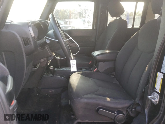 2018 Jeep Wrangler JK Unlimited Sport S with VIN 1C4BJWDG1JL907310, listed as a Copart auction lot 70826504 with 135,413 mi miles and Salvage Title. Bid and sale history available at carsss.com. Image 7.