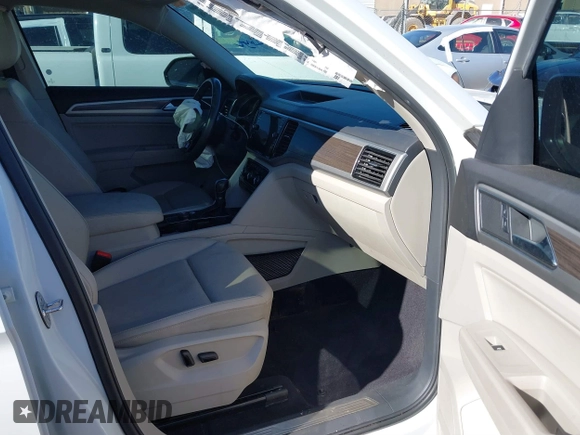 2018 Volkswagen Atlas SEL z VIN 1V2MR2CA3JC536009, wystawiony jako IAAI lot #40205798 z przebiegiem 125 945 mil mil oraz . Historia ofert i sprzedaży dostępna na DreamBid. Obrazek 5.