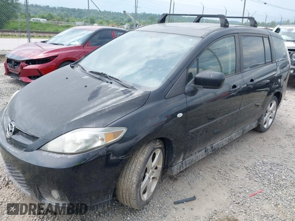 2007 Mazda 5 Touring with VIN JM1CR293X70134598, listed as a IAAI auction lot 42631794 with 139,071 mi miles and . Bid and sale history available at DreamBid. Image 2.