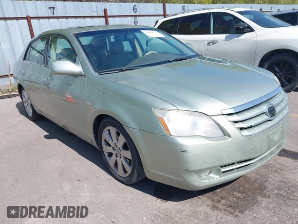 2007 Toyota Avalon XL with VIN 4T1BK36B07U239298, listed as a IAAI auction lot 42046413 with 221,018 mi miles. Bid and sale history available at carsss.com. Image 1.