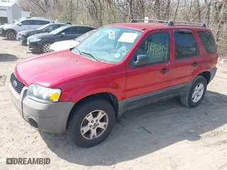 2006 Ford Escape XLT with VIN 1FMYU03186KA06262, listed as a IAAI auction lot 41912605 with 157,117 mi miles. Bid and sale history available at carsss.com. Image 2.