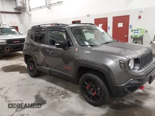 2017 Jeep Renegade Trailhawk z VIN ZACCJBCBXHPE90584, wystawiony jako IAAI lot #41992553 z przebiegiem 70 261 mil mil oraz . Historia ofert i sprzedaży dostępna na DreamBid. Obrazek 1.