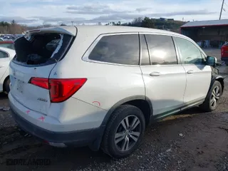 2016 Honda Pilot EX-L with VIN 5FNYF6H59GB025365, listed as a IAAI auction lot 41118130 with 141,530 mi miles. Bid and sale history available at carsss.com. Image 4.