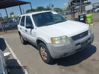 2001 Ford Escape XLT with VIN 1FMYU04131KB70753, listed as a IAAI auction lot 42174549 with 209,485 mi miles and . Bid and sale history available at DreamBid. Image 1.