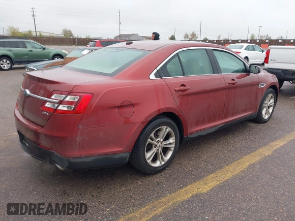 2014 Ford Taurus SEL with VIN 1FAHP2E86EG146478, listed as a IAAI auction lot 42131865 with 124,204 mi miles and . Bid and sale history available at DreamBid. Image 4.