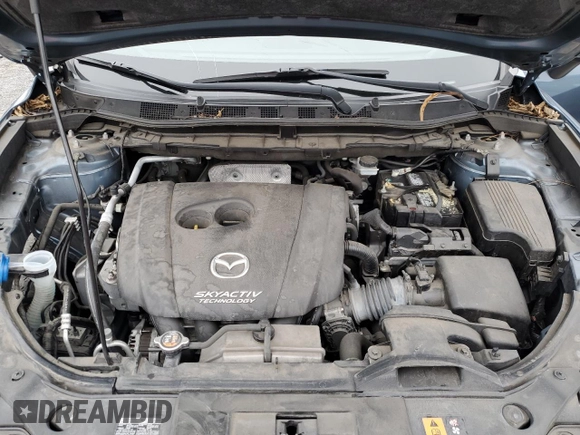 2016 Mazda CX-5 Grand Touring with VIN JM3KE4DY7G0761594, listed as a Copart auction lot 51514595 with 58,250 mi miles and Salvage Title. Bid and sale history available at DreamBid. Image 12.