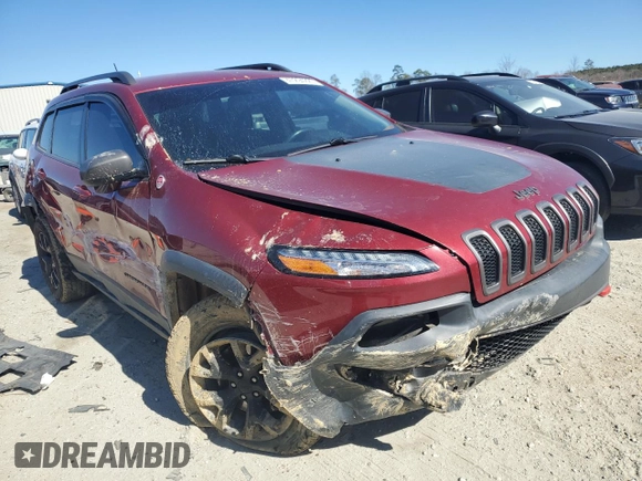2015 Jeep Cherokee Trailhawk z VIN 1C4PJMBBXFW615145, wystawiony jako Copart lot #47294225 z przebiegiem 99 662 mil mil oraz Szkoda całkowita • Salvage title. Historia ofert i sprzedaży dostępna na DreamBid. Obrazek 4.