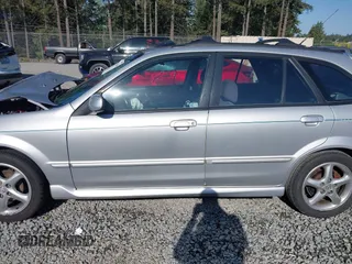2002 Mazda Protege z VIN JM1BJ246221493337, wystawiony jako IAAI lot #42171966 z przebiegiem 244 609 mil mil oraz . Historia ofert i sprzedaży dostępna na DreamBid. Obrazek 14.