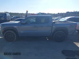 2023 Nissan Frontier Pro-4X with VIN 1N6ED1EK7PN604374, listed as a IAAI auction lot 41828936 with 60,452 mi miles and . Bid and sale history available at DreamBid. Image 14.