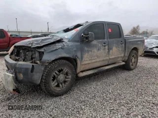 2011 Nissan Titan Pro-4X with VIN 1N6AA0EC1BN312125, listed as a Copart auction lot 50888085 with 188,856 mi miles and Salvage title. Bid and sale history available at DreamBid. Image 1.