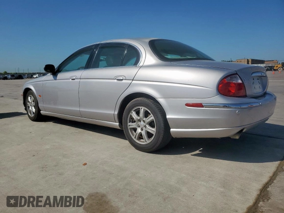 2003 Jaguar S-Type with VIN SAJEA01T43FM62477, listed as a Copart auction lot 52693085 with 109,761 mi miles and Salvage Title. Bid and sale history available at DreamBid. Image 2.