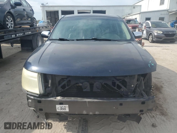 2009 Ford Taurus Limited with VIN 1FAHP25W59G124413, listed as a Copart auction lot 77771044 with 228,831 mi miles and Salvage Title. Bid and sale history available at carsss.com. Image 5.