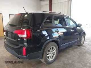 2014 Kia Sorento LX with VIN 5XYKTCA64EG541574, listed as a IAAI auction lot 42067910 with 144,234 mi miles and . Bid and sale history available at carsss.com. Image 4.