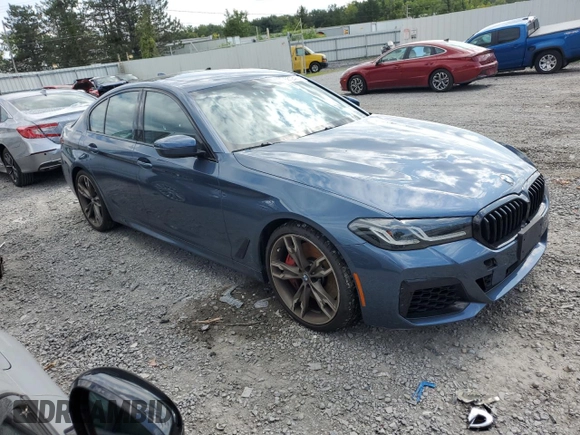 2023 BMW 5 Series M550i xDrive z VIN WBA13BK02PCN82953, wystawiony jako Copart lot #68124264 z przebiegiem 10 010 mil mil oraz Szkoda całkowita • Salvage title. Historia ofert i sprzedaży dostępna na DreamBid. Obrazek 4.