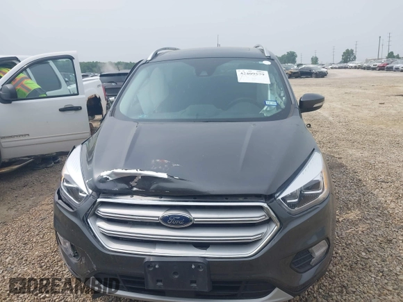 2019 Ford Escape Titanium with VIN 1FMCU0J97KUA34281, listed as a IAAI auction lot 42409579 with 55,400 mi miles and . Bid and sale history available at DreamBid. Image 13.