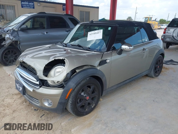 2010 MINI Convertible with VIN WMWMR3C52ATU97825, listed as a IAAI auction lot 42349417 with 64,045 mi miles and . Bid and sale history available at DreamBid. Image 17.