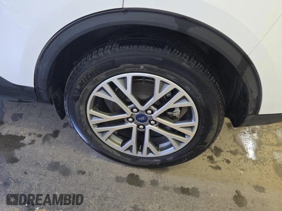 2021 Ford Escape SEL Hybrid with VIN 1FMCU9CZ1MUB25597, listed as a IAAI auction lot 42663573 with 79,061 mi miles and . Bid and sale history available at DreamBid. Image 7.