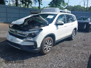2021 Honda Pilot EX with VIN 5FNYF6H38MB072297, listed as a IAAI auction lot 42561276 with 119,172 mi miles and . Bid and sale history available at DreamBid. Image 17.