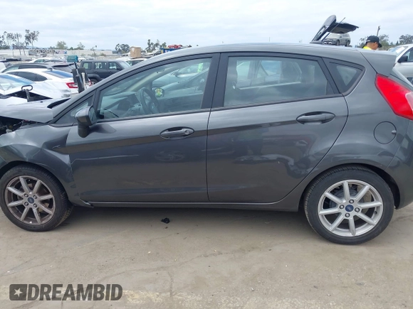 2018 Ford Fiesta SE with VIN 3FADP4EJ7JM127256, listed as a IAAI auction lot 41938121 with 83,211 mi miles. Bid and sale history available at carsss.com. Image 14.