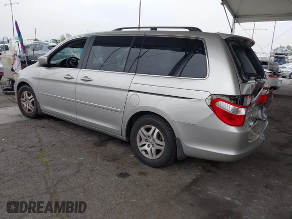 2007 Honda Odyssey EX with VIN 5FNRL38477B432832, listed as a IAAI auction lot 42153673 with 133,652 mi miles and . Bid and sale history available at DreamBid. Image 3.