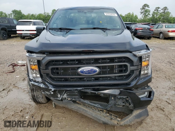 2023 Ford F-150 XL with VIN 1FTEW1C59PFC27499, listed as a Copart auction lot 54453255 with 58,554 mi miles and Salvage title. Bid and sale history available at DreamBid. Image 5.