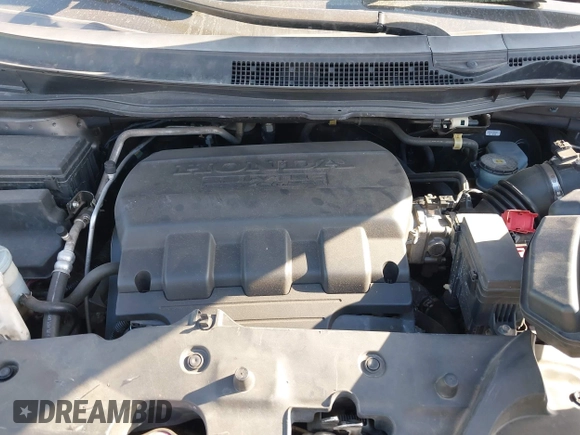 2015 Honda Odyssey EX-L with VIN 5FNRL5H67FB130663, listed as a IAAI auction lot 41988034 with 180,254 mi miles and . Bid and sale history available at carsss.com. Image 10.