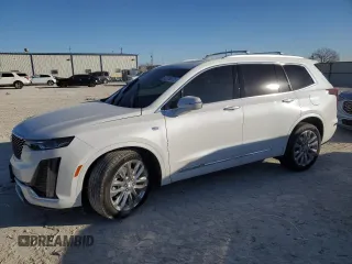2023 Cadillac XT6 FWD Premium Luxury with VIN 1GYKPCRS5PZ142516, listed as a Copart auction lot 42236075 with 17,668 mi miles and Salvage Title. Bid and sale history available at carsss.com. Image 1.