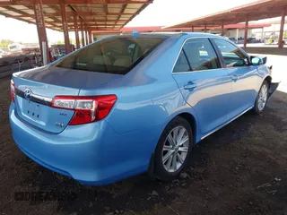 2012 Toyota Camry XLE z VIN 4T1BD1FK8CU003863, wystawiony jako IAAI lot #42336910 z przebiegiem 103 993 mil mil oraz . Historia ofert i sprzedaży dostępna na DreamBid. Obrazek 4.