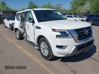 2023 Nissan Armada SV with VIN JN8AY2AD9P9692845, listed as a IAAI auction lot 42213250 with 59,880 mi miles and . Bid and sale history available at DreamBid. Image 1.