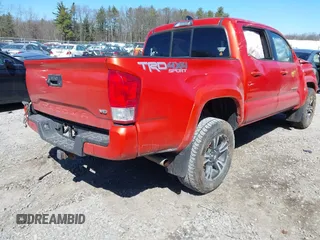 2016 Toyota Tacoma SR with VIN 3TMCZ5AN5GM031794, listed as a IAAI auction lot 41880146 with 87,287 mi miles and . Bid and sale history available at DreamBid. Image 4.