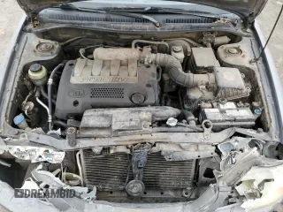 2003 Kia Spectra with VIN KNAFB121935265035, listed as a Copart auction lot 86407934 with 201,586 mi miles and Salvage Title. Bid and sale history available at DreamBid. Image 12.