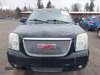 2011 GMC Yukon Denali with VIN 1GKS2EEF9BR261336, listed as a IAAI auction lot 41796533 with 149,808 mi miles. Bid and sale history available at carsss.com. Image 12.