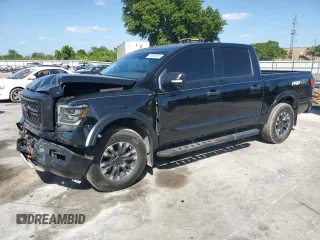 2023 Nissan Titan Pro-4X с VIN 1N6AA1ED4PN111986, выставлен на аукционе Copart как лот 55158975 с пробегом 36 476 миль миль и Списание • Salvage title. История ставок и продаж доступна на DreamBid. Изображение 1.
