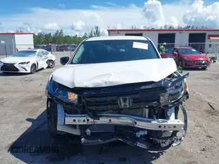 2024 Honda Ridgeline Sport with VIN 5FPYK3F14RB011166, listed as a IAAI auction lot 42591313 with 5,175 mi miles and . Bid and sale history available at DreamBid. Image 6.