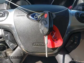 2012 Ford Focus SEL with VIN 1FAHP3M21CL413436, listed as a IAAI auction lot 42011706 with 392,754 mi miles. Bid and sale history available at carsss.com. Image 11.