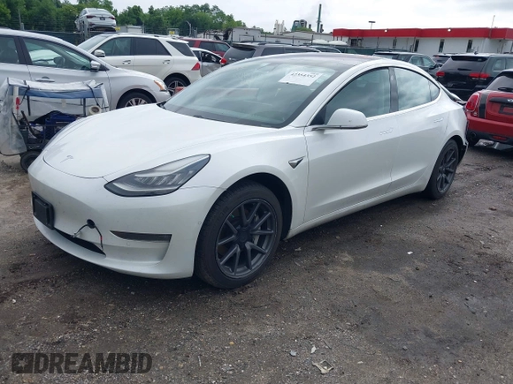 2019 Tesla Model 3 Mid Range z VIN 5YJ3E1EA7KF299755, wystawiony jako IAAI lot #42354352 z przebiegiem Nie podano mil oraz . Historia ofert i sprzedaży dostępna na DreamBid. Obrazek 2.