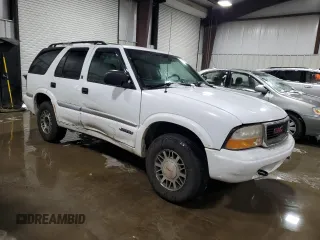 2001 GMC Jimmy SLT with VIN 1GKDT13W112100391, listed as a Copart auction lot 86098014 with 145,700 mi miles and Salvage Title. Bid and sale history available at carsss.com. Image 4.