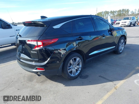 2021 Acura RDX w/Advance Package with VIN 5J8TC1H74ML011746, listed as a IAAI auction lot 41331679 with 72,676 mi miles. Bid and sale history available at carsss.com. Image 4.