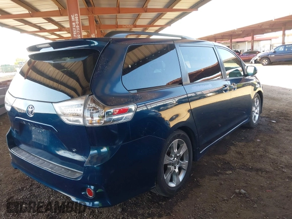 2012 Toyota Sienna SE with VIN 5TDXK3DC0CS264643, listed as a IAAI auction lot 42004082 with 118,675 mi miles. Bid and sale history available at carsss.com. Image 4.