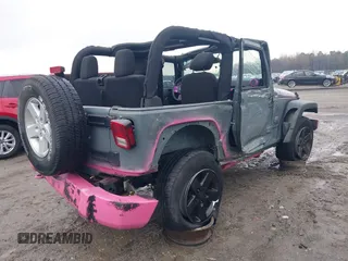 2015 Jeep Wrangler Sport with VIN 1C4AJWAG3FL589214, listed as a IAAI auction lot 41056259 with 101,758 mi miles and . Bid and sale history available at DreamBid. Image 4.
