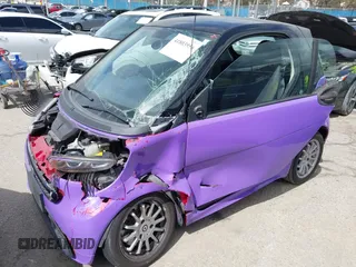 2013 Smart fortwo Pure with VIN WMEEJ3BA0DK686417, listed as a IAAI auction lot 41803956 with 83,850 mi miles. Bid and sale history available at carsss.com. Image 6.