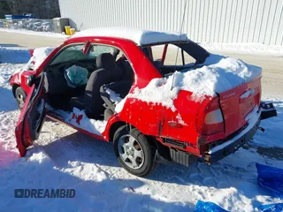 2002 Hyundai Accent GL with VIN KMHCG45C72U285130, listed as a IAAI auction lot 41373423 with 58,685 mi miles. Bid and sale history available at carsss.com. Image 3.